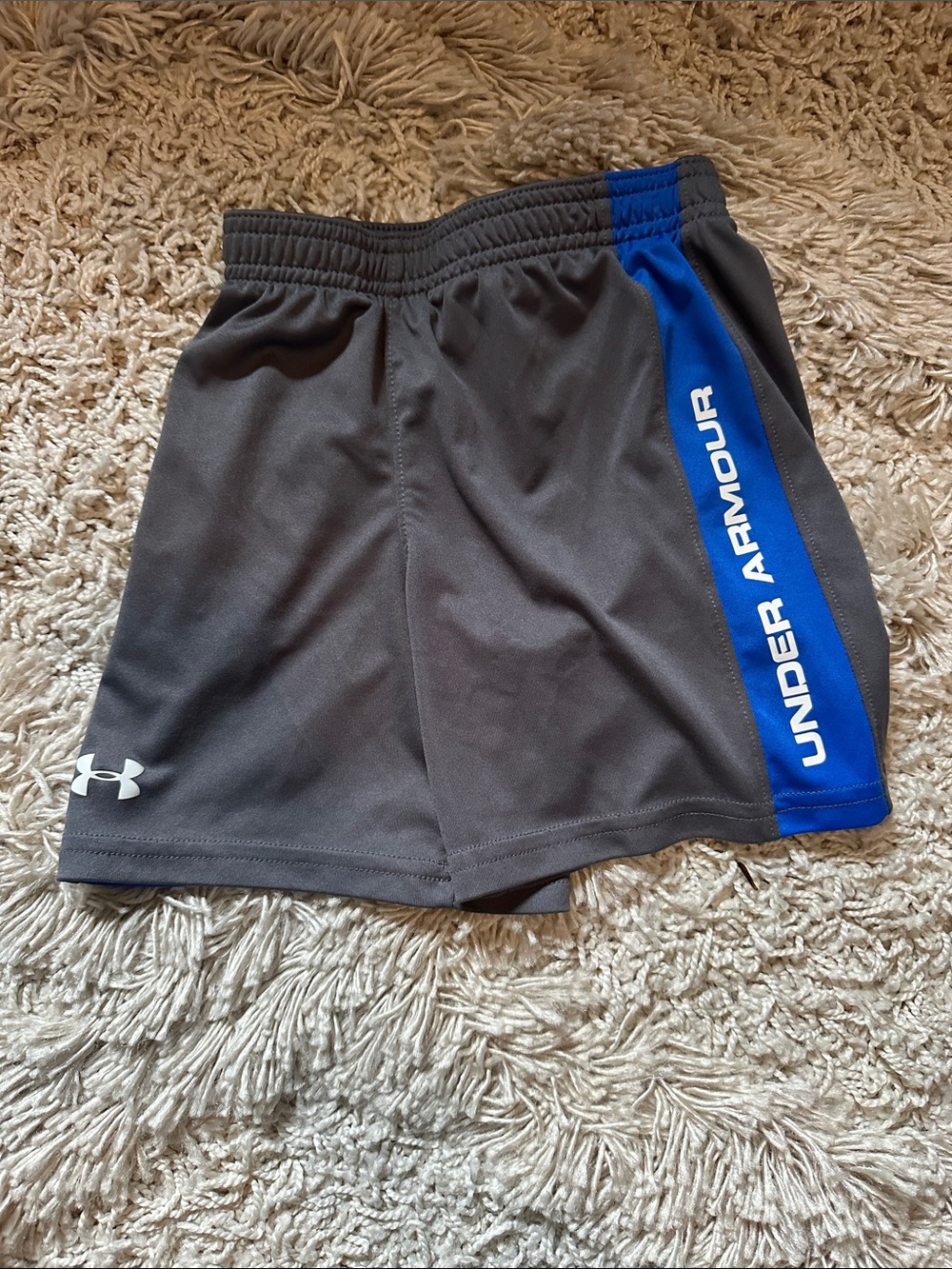 Under Armour boys Gray Athletic Shorts with Blue Side Stripe